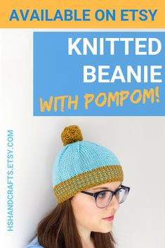 a woman wearing glasses and a knitted beanie with pompom on it