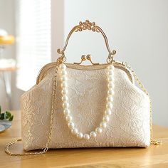 Category:Clutch; Embellishment:Pearls,Buckle,Chain; Gender:Women's; Type:Evening Bag,Wristlet; Occasion:Wedding Party,Party; Material:Polyester,Lace; Width:9; Height:19; Function:Lightweight,Multi Carry; Pattern:Solid Color; Listing Date:08/09/2024; Production mode:External procurement; Length:26; Detachable strap:Detachable; Adjustable strap:Non-Adjustable Style Année 20, Vintage Lace Weddings, Clutch Bag Wedding, Aesthetic Bags, Wedding Clutch, Purse Brands, Ladies Clutch, Vintage Pearls, Evening Clutch Bag