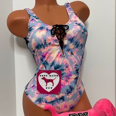 New With Tags Victoria’s Secret Pink Pink Swim One-Piece Swimsuit Removable Padding High Leg Low Back Logo Strappy Caged Cut Out Lots Of Cheek Peek Strappy Front Criss Cross Tropical Tie Dye Size Small Fits 32c 32d 34a 34b Size Small Fits Us Sizes 4-6 Size Medium Fits 34c 34d 36a 36b Size Medium Fits Us Sizes 8-10 No Offers Please Trendy Pink One-piece Swimwear, Trendy Pink Bodysuit For Beach Season, Casual Pink Bodysuit For Summer, Pink Bodysuit For Swimming In Spring, Casual Pink Bodysuit For Swimming, Trendy Bodysuit For Pool In Spring, Fitted Pink Bodysuit For Vacation, Casual Pink Bodysuit For Poolside, Trendy Pink Summer Bodysuit