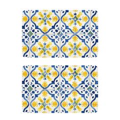 two blue and white tiles with yellow flowers on them