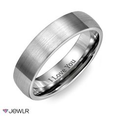 a men's wedding band with the words love you engraved in silver on it