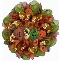 a wreath with the word fall spelled on it