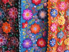 three different colors of fabric with flowers on them