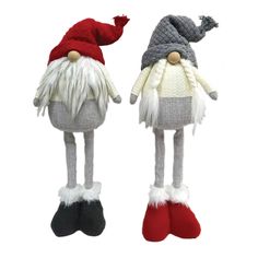 two knitted gnomes with hats and mittens, one in grey and the other in red