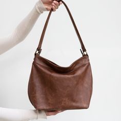 Brown leather shoulder bag - Hobo purse in distressed leather - Crossbody leather bag - Slouchy handbags - HELEN Classic Handheld Hobo Bag For Everyday Use, Versatile Handheld Hobo Bag With Leather Handles, Versatile Handheld Hobo Bag, Handheld Hobo Bag For On-the-go, Modern Hobo Shoulder Bag, On-the-go Soft Leather Hobo Bag, Everyday Use Hobo Shoulder Bag, Hobo Bucket Bag For Everyday Use, Elegant Everyday Hobo Bucket Bag