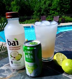 limeade, limeade and rum in front of a swimming pool