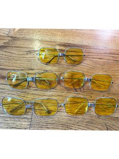 "These are the real deal!! 1970s mens yellow real glass silver frame sunglasses!  There are in good conditions and do not have proscription lenses. There are vintage frame so please be a-wear that they are not perfect. Its best to take to your eye doctor just to bend the arms into the perfect place for you! If you need more photos reach out happy to provide! Measurements: Length: 6\" Length from one lens to the other:5.5\" Lens Height:2\" Arm Length: 5\" 💗Follow on Instagram to see videos of it Retro Yellow Sunglasses With Gradient Lenses, Cheap Vintage Yellow Sunglasses, Yellow Tinted Glasses, Retro Yellow Sunglasses With Mirrored Lenses, Vintage Yellow Sunglasses With Uva Protection, Vintage Orange Sunglasses With Mirrored Lenses, Luxury Yellow Vintage Sunglasses, Vintage Yellow Polarized Sunglasses, Sunglasses Silver