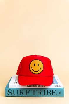 Next time someone tells you to smile, just dip your head down and your work here is done. Our Happy Trucker hat is perfect to throw on during a dirty hair day with jean shorts and a tee. Snap Back Trucker Hat One Size Fits Most. 100% Polyester Front; 100% Nylon Mesh Sara C, Black Neon, Snap Back, Red Blue Green, Black Khakis, Snap Backs, Bad Hair, Neon Orange, Summer Hats