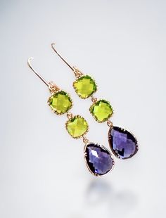 Peridot Earrings - Peridot Gold Dangle Earrings, bridesmaid gifts, Wedding Earrings, August Birthstone earrings, Birthday Gift  This stunning jewelry set is the perfect gift for any special occasion! These beautiful handmade earrings are the perfect addition to any jewelry collection. The combination of peridot and amethyst creates a stunning green and purple color scheme that will complement any outfit. Eye-catching design featuring natural peridot and amethyst gemstones. Made with high-quality Briolette Gemstone Earrings For Wedding, Green Briolette Earrings For Wedding, Purple Briolette Earrings For Wedding, Peridot Earrings, Amethyst Gold, Birthstone Earrings, Earrings Bridesmaid, August Birthstone, Purple Earrings