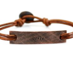 "Personalize this custom tag id bracelet with your own message, add names, dates, coordinates, initials or inspirational words and make the perfect reminder gift of your love and care. Metal - Copper Tag Dimensions - The tag is hand cut from 1mm metal sheet aproximatelly 4.5 x 1cm. Leather -2.2mm genuine double leather with button clasp. Engraving - Hand stamped with up to 30 characters on each side. Finish - Oxidized. Size - To find your size, please measure your wrist tight with a thin cord an Initials Bracelet, Roman Numerals Dates, Mens Bracelet Personalized, Bracelet For Him, Medical Bracelet, Custom Bracelet, Oxidized Copper, Bracelet Leather, Custom Tags