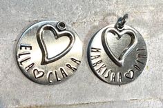 "Personalized Mothers Name Necklace, Name Necklace, Custom Grandmother Necklace, Nana Necklace, Kids name necklace, Mommy Jewelry Mothers Day Gift Idea, Push Present THIS ITEM ONLY FITS (2) NAMES: Layered, Heart charm, with up to 2**Custom Names stamped on 1\" disc Choose a heart in between the names or if one name, choose if you want hearts on both ends of the name. This name disc hangs on a 1.8 mm silver plated open chain necklace, 18\" in length. The open heart charm is antique silver. This i Personalized Heart Charms For Anniversary, Personalized Charms For Valentine's Day Gift, Stamped Charm Necklaces For Mother's Day, Personalized Charms For Anniversary And Valentine's Day, Heart-shaped Charms For Mother's Day Anniversary, Heart-shaped Charms For Anniversary And Mother's Day, Adjustable Nickel-free Charm Necklace For Mother's Day, Mother's Day Nickel Free Charm Necklace With Round Pendant, Mother's Day Nickel Free Pendant Charm Necklace