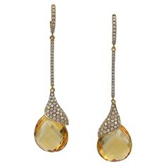 The fluid elegance of these Contemporary Citrine Diamond Pavé Drop Earrings, made in the 21st century, brings to mind the ornamental style that flourished between about 1890 and 1910 throughout Europe and the United States, characterized by its use of a long, sinuous, organic lines and expressive curvilinear forms. Art Nouveau, in architecture, interior design, illustration, and jewelry design, developed a graceful formal vocabulary to celebrate the natural world, both flora and fauna. These flo Formal Vocabulary, Curvilinear Forms, Golden Honey, Organic Lines, Pastel Yellow, Floral Earrings, Architecture Interior, 21st Century, Pave Diamonds