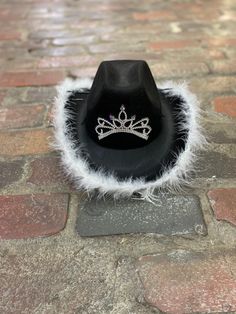 Looking for a fun gift for any party, girls night out, or bachelorette party?  This Adorable cowgirl hat is any princesses dream. Perfect for birthdays, dressing up, or heading to the rodeo! We attached a sparkly feathered boa around the brim to add some sassy flair. The princess tiara is perfect for any girl! One size fits most ADULTS up to 22inches in size. The perfect one size hat for a party! *children sizes are also available in our shop !! Size: fits most adults from 12 years old to 105yrs Bachelorette Party Hat, Party Girls Night, Rootin Tootin, Hat Party, Hat Fits, Pink Cowgirl, Halloween Hats, Princess Tiara, Cowgirl Hat