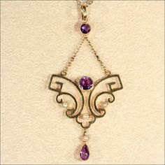 "My friend Judy has the best taste in lavaliere pendants and necklaces. Every time I go to London she has a little bundle of them set aside for me. She knows just what I like, not the plain, boring ones, no, no, I like the fancy ones, with a combination of gems, white, green, purple, blue, any combo will do! Here's one she had set aside for me last time, a lovely shape, with wonderful movement and bright gems, contrasting with creamy pearls. Hand crafted 9 karat gold Edwardian Lavaliere necklace Spring Green, Chain Necklace, Amethyst, Gems, Necklaces, Pendant Necklace, Drop Earrings, Chain, Purple