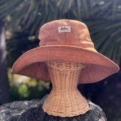 "A wide brim sun hat for beach days and summer fun.  This sun hat for women has a nice wide brim to protect your whole face and even your neck and chest.  This hat folds up so it is easy to bring along in your bag.   This hat is made from a medium weight homespun linen and cotton blend fabric in a rust color.  Inside liner is white cotton.  I used a stiff interfacing for brim to keep it's shape. A sun hat for beach days and summer fun.  This sun hat for women has a nice wide brim to protect your Cheap Adjustable Wide Brim Bucket Hat, Wide Brim Bucket Hat With Upf 50+ For Sunbathing, Upf 50+ Wide Brim Bucket Hat For Sunbathing, Lightweight Bucket Hat With Curved Brim For Sunbathing, Lightweight Wide Brim Bucket Hat For Sunbathing, Bucket Hat With Upf 50+ For Sunbathing, Uv Protection Wide Brim Sun Hat, One Size Sun Hat With Short Brim For Sunbathing, Lightweight Adjustable Bucket Hat For Sunbathing