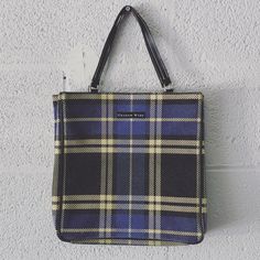 Never Used, Held Onto This For Years. No Flaws. Trendy Plaid Pattern, Fuzzy Velour Feel Fabric. Vinyl Inside With Zipper Pocket. Measurements: 11x 11 X 4 With 6 Inch Strap Drop Black/Blue/Yellow Plaid. Preppy Blue Everyday Bag, Preppy Blue Bags For Everyday Use, Preppy Blue Bag For Everyday Use, Coach Pillows, Tory Burch Robinson Tote, Tory Burch Kira Chevron, Kira Chevron, Color Block Tote, Plaid Tote