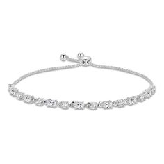 This stunning bolo bracelet showcases a sparkling array of oval and round-cut white lab-created sapphires set in classic sterling silver. The adjustable bracelet secures with a bolo closure. Gold Layered Bracelets, Neil Lane Engagement Rings, Pearl Diamond Jewelry, Cross Jewelry Necklace, Fan Jewelry, Bezel Engagement Ring, Bolo Bracelet, Diamond Wedding Rings Sets, White Lab