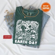 Earth Day Shirts, Planet T-Shirt, Graphic Tees for Women, Be Kind To Our Planet T-Shirt, Environmental Gifts, Climate Change Awareness HOW TO ORDER 1-Please carefully review all photos of the product. 2-Select the shirt type and size according to your preferences. 3-Choose the shirt color from the available options in the drop-down menu. (Please note that actual colors may vary slightly due to monitor differences.) 4-Click "Add to Cart". You can always go back to add more shirts to your order. 5 Letter Print Crew Neck Top For Earth Day, Earth Day Letter Print Crew Neck Top, Green Crew Neck Tops For Earth Day, Relaxed Fit Crew Neck Tops For Earth Day, Green Casual Tops For Earth Day, Earth Day Screen Print Short Sleeve Tops, Earth Day Graphic Tee With Crew Neck, Earth Day Graphic Print Short Sleeve Top, Short Sleeve Graphic Print Tops For Earth Day