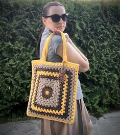 A crocheted bag in bright summer color is a great accessory for your walks and beyond. Handmade, grandmother's square motif. Tied with 2 mm cotton cord, does not lose color. Composition: cotton 85%, polyester 15%. The size of the bag is 39x40 cm, the handle is 23 cm. You can carry the bag on your shoulder or in your hand. You can also make individual orders with desired colors. Bag without lining, without clasp. Weight 645 grams. With love - Tetyana Beach Bag Crochet, Color Composition, Summer Bag, Summer Color, Bag Crochet, Mesh Bag, Cotton Cord, Summer Colors, Beach Bag