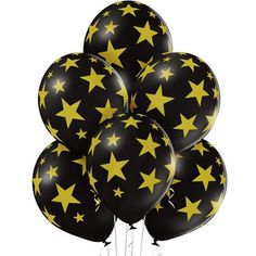 black and gold stars balloons with white stems