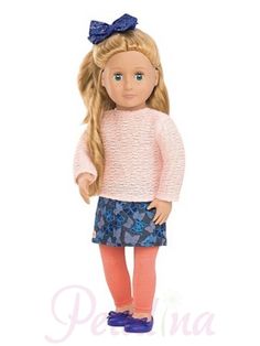 a doll with long blonde hair wearing a pink sweater and blue floral print skirt is standing in front of a white background