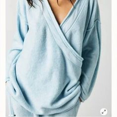 Comfy, Super-Soft And Cozy Light Blue Color 88% Polyester, 6% Polyamide, 6% Elastane Size S Length: 29'', Pit To Pit: 25'' New Without Tag, Tag String Still Attached B-53(8) - 3 Cozy V-neck Sweatshirt For Loungewear, Spring V-neck Sweatshirt For Loungewear, Cozy V-neck Top With Soft Texture, Blue Relaxed Fit Sweater For Loungewear, Cozy Blue Sweatshirt For Loungewear, Light Blue Cozy Long Sleeve Tops, Soft Texture Tops For Relaxation In Spring, Soft Textured Tops For Spring Relaxation, Winter Sleep Tops With Relaxed Fit