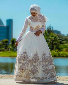 Handwoven Habesha Dress New Year Modern Habesha Kemis Habesha Libs Eritrean Dress ሀበሻ ቀሚስ ሀበሻ ልብስ White Floor-length Dress With Gold Embroidery, Festive White Dress With Gold Embroidery, White Anarkali Dress With Gold Embroidery, Long Dress With Intricate Embroidery For Festive Occasions, Elegant White Embroidered Dress For Festivals, Festive Long Dress With Intricate Embroidery, White Traditional Drape Dress With Dabka, White Traditional Drape Dress For Festivals, White Dresses With Dabka In Traditional Drape Style