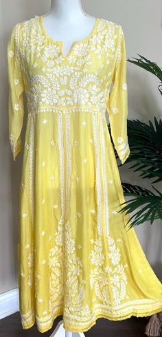 Soft flowy muslin yellow Anarkali ! Luxurious shaded fabric with hand embroidery. Kurta Length- 46 inches Yellow Embroidered Floor-length Churidar, Yellow Straight Kurta Anarkali Set With Chikankari Embroidery, Yellow Anarkali Set With Chikankari Embroidery, Straight Kurta, Traditional Designer Yellow Kurta, Traditional Yellow Floor-length Salwar Kameez, Bollywood Style Yellow Kurta With Zari Work, Spring Designer Anarkali Set With Cutdana, Yellow Floor-length Chikankari Churidar, Yellow Floor-length Churidar With Chikankari Embroidery