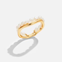 Keep it elegant & sleek with this Orelia Pearl Double Layer Ring. Wear alone or stack with other minimalist rings for that effortless look. 18K gold plated, copper Freshwater pearl Hypoallergenic, lead & nickel free US/Canada Ring Size UK/AU Ring Size Inside Diameter (mm) 6 L 16.6mm 7 N 17.2mm 8 P 18.1mm If you aren't in LOVE with your purchase, please let us know within 30 days of receiving your item, and you'll receive a stress-free refund. Modern Gold Pearl Ring For Wedding, Gold Everyday Pearl Ring With Pearl Drop, Everyday Gold Pearl Ring With Pearl Drop, Everyday Gold Pearl Drop Ring, Adjustable Gold Pearl Ring For Formal Occasions, Classic Gold Stackable Pearl Rings, Everyday Gold Pearl Ring, Modern Gold Pearl Ring For Everyday, Everyday Gold Pearl Open Ring