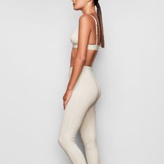 These cotton leggings hug the body yet allow your skin to breathe with cool and comfy natural fibers. The classic, rustic design elevates your lounge look. | SKIMS Legging | White | Cotton Rib Cream Leggings, Lounge Looks, Thermal Leggings, Comfy Leggings, Comfortable Leggings, White Leggings, Ribbed Leggings, Cotton Leggings, Comfy Fashion