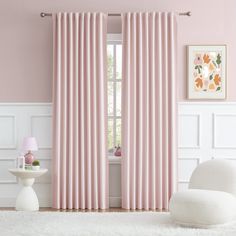 the pink curtains in this room are very soft and light, but it's not too