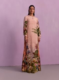 Elevate your fashionista style with the Ania Jalabiya dress, an exciting addition to your wardrobe. Crafted from a luxurious viscose blend, the powder pink hue adds a touch of allure, while the mesmerizing lotus bloom print infuses playful and vibrant energy. Perfect for any occasion, this dress ensures you stand out with effortless elegance. Indian Western Dress, Jalabiya Dress, Traditional Indian Outfits, Pink Tunic, Fashionista Style, Sharara Set, Indian Clothing, Indian Fashion Designers, Traditional Indian