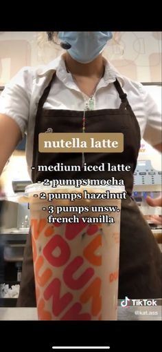 a woman wearing an apron and holding a cup with the words nutella latte on it