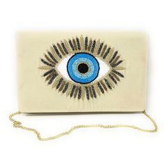 Introducing our stunning hand beaded clutch purse featuring an intricate evil eye motif design. This beautiful accessory is perfect for any occasion with its perfect size to fit all your essentials. The neutral color palette makes it versatile to pair with any outfit. Complete with a chain strap for added convenience, this clutch purse is a must-have addition to your collection. Stand out in style and ward off negativity with this unique and eye-catching accessory. The back and inside of the clu Bohemian Embellished Evening Bag As Gift, Bohemian Embellished Clutch Gift, Bohemian Embellished Clutch For Gift, Bohemian Embellished Clutch As Gift, Bohemian Evening Rectangular Clutch, Bohemian Beaded Rectangular Evening Bag, Bohemian Embroidered Clutch Evening Bag, Bohemian Rectangular Evening Bag For Party, Bohemian Embellished Rectangular Evening Bag