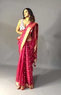 Spread love and positive vibes with this cute and fun saree with dainty embroidered hearts! Golden borders and pallu highlight the drape. The fabric is linen by linen. Linen is a natural fabric and the machine embroidery is dense so there may be slight irregularities and stretching around the motifs. These are characteristic and are not considered as defects. The saree is ready to wear with falls and pico done, long tassels add more beauty to it! An unstitched blouse fabric is included. Note: Colors displayed on screen may vary slightly from the actual product due to variance in screen calibration and other factors. Note: There may be minor inconsistencies in the embroidery and the sarees weaving. These are characteristic and not considered defects. Embroidered Hearts, Linen Saree, Embroidered Heart, Natural Fabric, Handmade Gift Wrap, Spread Love, Blouse Fabric, Pure Linen, Natural Fabrics