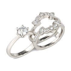 Woo her, wow her and win her with this dazzling bridal set. Expertly crafted in 925 sterling silver, the engagement ring is a high polished classic ring and two bands are in vintage style.They are in perfect match. When worn together, the ring set blossoms like a glistening flower on her finger. Treat your beloved ones this ring set as a new year gift. She will be very delighted to see your gift.Carat Weight: 2.5 ctStone Size: 7 mmStone Type: Jeulia® StoneNumber of Stones: 1 Stone Color: Diamond WhiteStone Shape: RoundCarat Weight: 1.045 ctStone Size: 2*4,1,1.5 mmStone Type: Jeulia® StoneNumber of Stones: 38 Stone Color: Diamond WhiteStone Shape: Marquise, RoundWeight: 7.3 gWidth: 16.3 mmHeight: 6.6 mmThickness: 7.9 mmMaterial: 925 SilverPlating Color: Silver Enhancer Ring, Set Ring, New Year Gift, Bridal Ring Set, Classic Ring, Bridal Set, Bridal Sets, Quality Jewelry, Vintage Sterling Silver