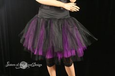 "Handmade from three layers around 35yards of soft smooth black bridal tulle. All layers of the Bridal tulle are tightly machine gathered and serged to the wide fabric stretch waistband. Skirt is made without an underskirt, it can bee seen through, since tulle is naturally sheer. 20\" longest length This skirt is not made yet, It is made when ordered! Measurement: Sizes go by smallest waist size tutu will fit to largest Hips tutu fits over XSmall 24\"-34\"inches Small 26\"-38\"inches Medium 30\" Halloween Party Tulle Petticoat, Stretch Petticoat For Halloween Costumes, Halloween Stretch Tulle Petticoat, Stretch Tulle Petticoat For Halloween, Fitted Purple Skirt For Cosplay, Purple Fitted Skirt For Cosplay, Fitted Tulle Skirt For Halloween, Halloween Fitted Tulle Petticoat, Halloween Fitted Tulle Skirt