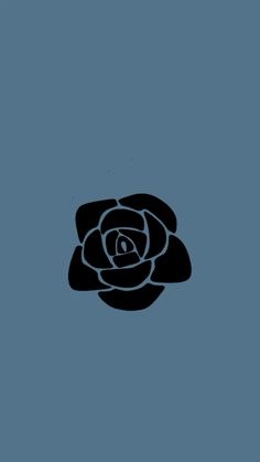 a black rose on a blue background with the letter d in it's center