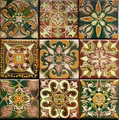 nine different colored tiles with designs on them