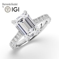 an emerald cut diamond engagement ring with side stones