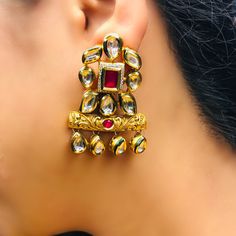 These are a beautiful pair of Earrings, made with beautifully Kundan beaded. These earrings work well with all types of clothing, whether it be formal attire or a casual party. Option 1 : Red Color (E716) Option 2 : Green Color (E717) Eye-catching and unique jewellery that will set you apart. Gift this piece to a loved one, and see their face light up with joy. Best for gifting or for personal use, wear it to any occasion and be in the spotlight. Types Of Clothing, Kids Handicraft, Saree Jewellery, Silver Pooja Items, Glass Bangles, Silver Toe Rings, Gold Chain With Pendant, Ruby Beads, Kundan Earrings