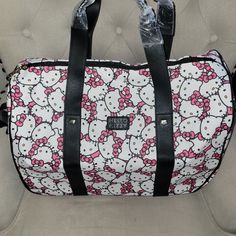 This Is A Brand New Hello Kitty Travel Bag With Extended Handle And Wheels If Needed. This Is Heavy Duty Quality Made With Carry Strap Or Carry On. It Measurements Are 12 Inch Height, 20 Inches Long And 11 Inches Wide. Get It While You Can. Won't Last! Rectangular Hello Kitty Shoulder Bag For Travel, Hello Kitty Print Shoulder Bag For Travel, Travel Rectangular Bag With Hello Kitty Print, Hello Kitty Print Travel Shoulder Bag, Trendy Hello Kitty Bags For Everyday Use, Trendy Hello Kitty Print Bag For Everyday Use, Trendy Hello Kitty Everyday Bag, Trendy Hello Kitty Bag For Everyday, White Hello Kitty Print Bag