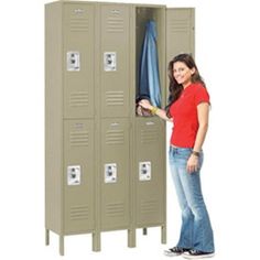 a woman standing in front of two lockers