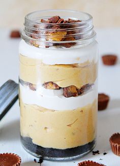 a jar filled with food sitting on top of a table