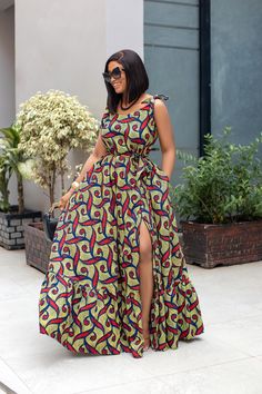 African print cotton fabric. The Jayjay dress is a versatile flowy dress with a length 61/62. It can be style in so many ways and worn in different seasons. It comes with a detachable belt for a more cinched look. Model is wearing a size S/M and is 5'6 tall. Side slit with zipper for closure. Pockets. Unlined. Pleats Tie straps. Tie Strap Dress, African Clothes, Design Dresses, Different Seasons, Dress Yellow, African Design Dresses, African Design, Wedding Plans, Flowy Dress