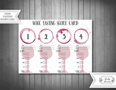 the wine tasting score card is displayed on a wooden table with a ribbon around it