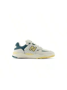 The first pro-endorsed skate shoe by Tiago Lemos features a mix of '90s skateboarding inspiration and New Balance heritage style. 
NB Numeric Tiago Lemos 1010 White With New Spruce         Sports & Outdoor Shoes, size features are:Bust: ,Length: ,Sleeve Length: Green Skate Shoes With Boost Midsole For Streetwear, Retro Basketball Shoes With Speckled Midsole For Streetwear, Retro Green Custom Sneakers For Streetwear, Retro Mid-top Skate Shoes With Gum Sole, Green Low-top Skate Shoes For Streetwear, Green Skate Shoes With Gum Sole For Streetwear, Retro Low-top Skate Shoes For Sports, Retro Yellow High-top Sneakers For Streetwear, Green High-top Sporty Sneakers For Skateboarding