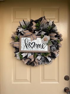 a wreath with the word home on it