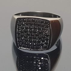 💍Amazing black diamond ring. 📜 Hand-made diamond ring in gold K9, K14 or K18. Square TV top set with black diamonds or black spine if you prefer lower cost with the same look.  A black-plated pattern all over the ring gives a sophisticated character to the ring. Choose it for you .. you're worth it. Ideal gift for your loved person also. ✍ Designed and created by Babuco Athens. ♻A recycled piece. ⚖ Ring's weight: In K9 7,5grm, in K14 8,5grm and in K18 9,5grm approxemently. 📐Top Dimensions: 15X15mm. 💎Gems certificate available. 🎁Gift box included. 😊Thank you for stopping by. Modern Formal Rings With Black Diamonds, Modern Black Diamond Ring For Formal Occasions, Black Diamond Rings As Gift, Black Rings With Diamond Accents And Black Spinel, Modern Black Diamond Round Rings, Black Spinel Rings With Diamond Accents, Black Stainless Steel Signet Promise Ring, Black Cubic Zirconia Ring With Vvs Clarity, Luxury Black Cubic Zirconia Rings