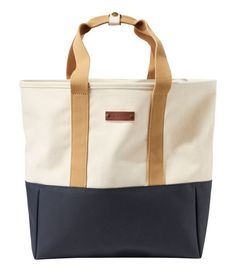 Our rugged, weather-resistant canvas tote now comes in a versatile open-top style. Designed with a puddle-proof bottom for wet grass, boating and more. Spot clean. Durable, puddle-proof coating on outside bottom. Made of rugged, heavy-duty 100% cotton canvas. Water-resistant polyurethane coating on upper part of interior. Snap closure on handles. Stands upright for easy loading and unloading. Antiqued brass hardware and leather trim. Imported. | Nor'easter Tote Bag, Open-Top, Canvas Coated Fabri Outdoor Canvas Tote Bag With Reinforced Handles, Outdoor Cotton Bag With Reinforced Handles, Canvas Bags With Reinforced Handles For Outdoor Activities, Canvas Tote Bags For Outdoor Activities, Coated Canvas Bags With Canvas Lining For Outdoor Activities, Coated Canvas Bags With Canvas Lining For Outdoor, Casual Duck Canvas Bags For Outdoor Activities, Waterproof Functional Canvas Bags, Functional Waterproof Canvas Bags